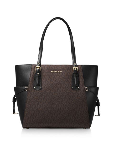 michael kors women's voyager east west tote bag black|Michael Kors voyager tote sale.